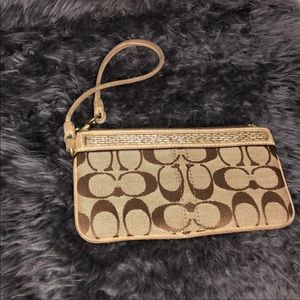 Coach Gold mini wristlet